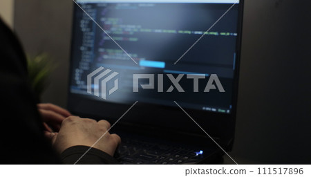 Young woman, developer programmer, software engineer, IT support, working hard at night overtime on computer. 111517896