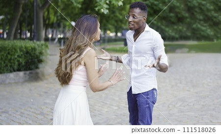 Woman trying to calm down her boyfriend 111518026