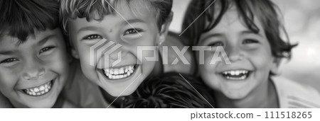 Black and white photo of smiling happy children looking at the camera, happy carefree childhood, banner 111518265