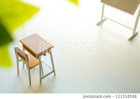 Spring new semester image: school classroom desks and blackboard Spring new semester image: school classroom desks and blackboard 111518598