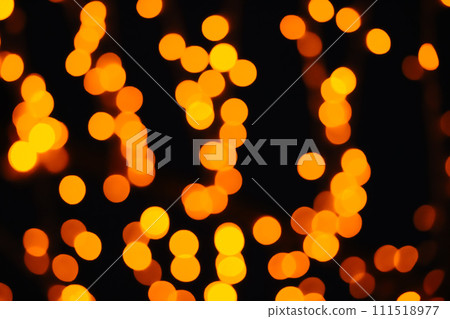 Blurred christmas background and bokeh defocus yellow light. Color fortuna gold. 111518977