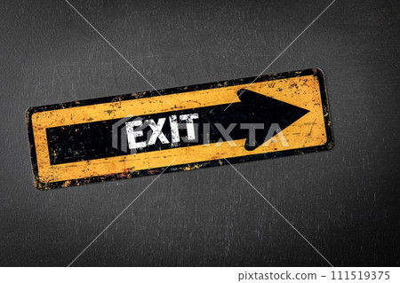 Exit. Direction arrow with text on a dark chalkboard background 111519375