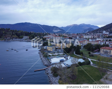 View of Riva del Garda city, Garda lake, Italy, alps mountains. 111520088