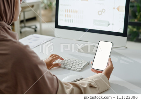 Smartphone with blank screen in hand Smartphone with blank screen in hand 111522396