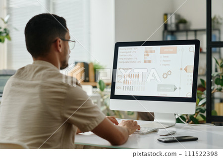Looking through statistic data on screen Looking through statistic data on screen 111522398