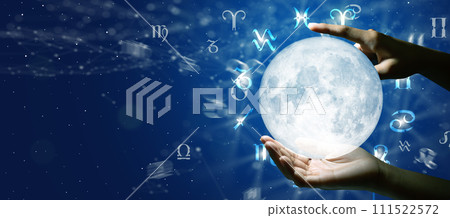 Astrological zodiac signs over the moon in hand. Knowledge of the stars in the sky. The power of the universe concept. Astrological zodiac signs over the moon in hand. Knowledge of the stars in the sky. The power of the universe concept. 111522572