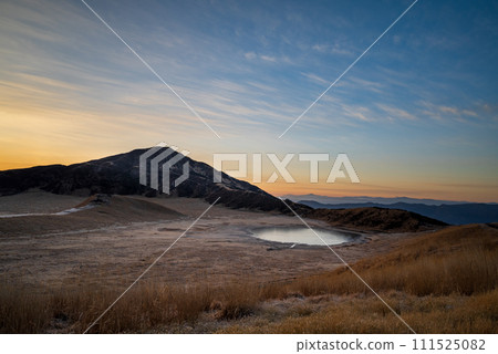 Beautiful scenery of volcanic smoke rising over Aso in early spring 111525082