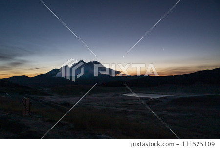 Beautiful scenery of volcanic smoke rising over Aso in early spring 111525109