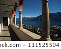 Lake Elegance: A Grand Terrace Overlooking the Tranquil Waters and Mountainous 111525504
