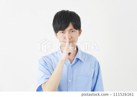A man making a secret gesture, white background 111526161