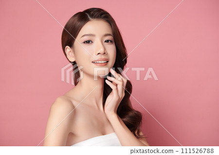Beautiful young asian woman with clean fresh skin on pink background, Face care, Facial treatment, Cosmetology, beauty and spa, Asian women portrait. 111526788