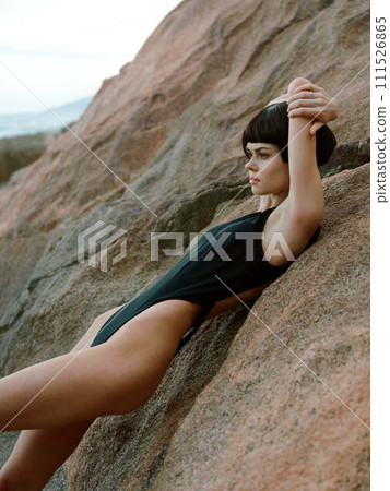 Sensual Summer Beauty: Gorgeous Woman Posing in Sexy Swimwear on a Tropical Beach. 111526865