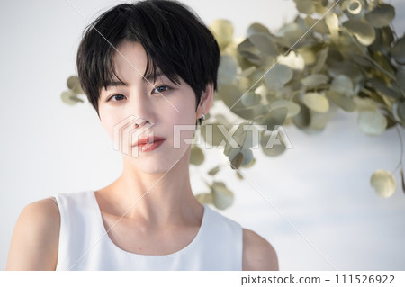 Gold beauty image of a beautiful woman looking at the camera in summer etc. 111526922