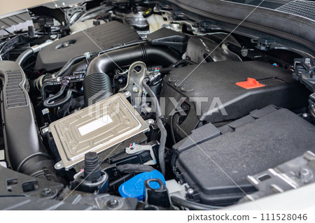 modern car engine under hood close up detail modern car engine under hood close up detail 111528046