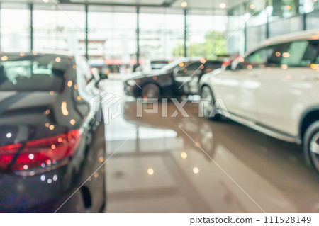 new cars in showroom interior blurred abstract background new cars in showroom interior blurred abstract background 111528149