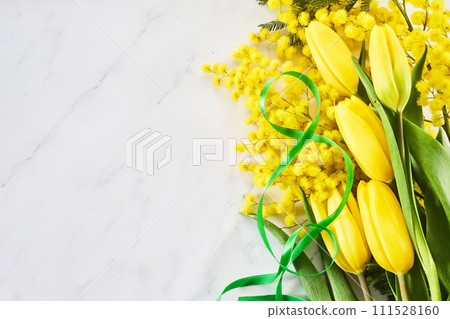 Greeting for International Women's Day on March 8th. Branches of mimosa and tulips 111528160