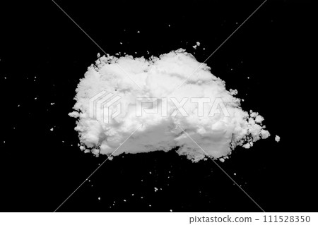 White snow isolated on black background close up 111528350
