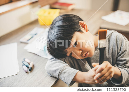 A boy drawing A boy drawing 111528790