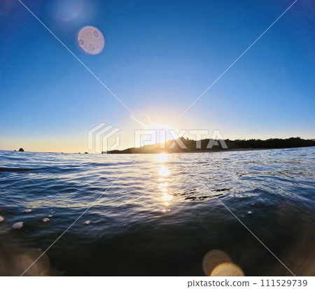 sunset and water drops 111529739