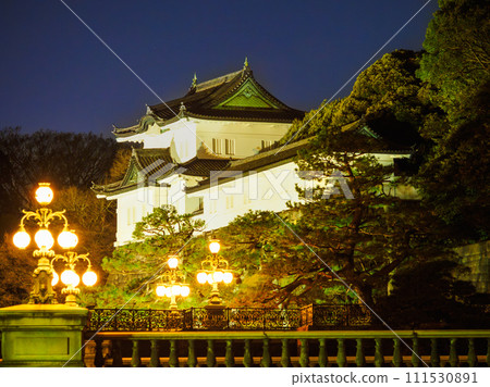 Fushimi turret illuminated at dusk 111530891