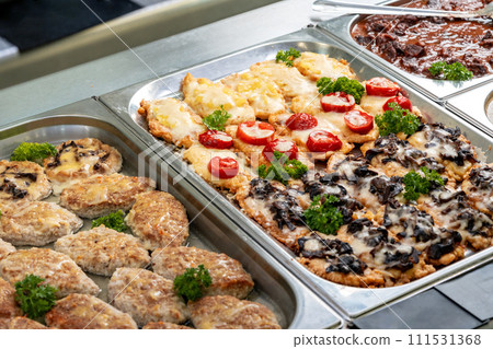 Display with fresh cooked food in a canteen Display with fresh cooked food in a canteen 111531368