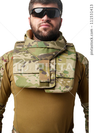 Soldier wearing military uniform close up photo Soldier wearing military uniform close up photo 111531413