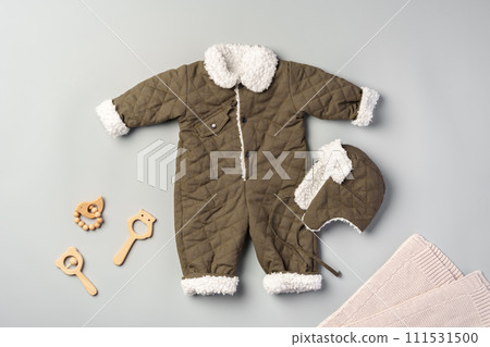 Gray quilted baby overalls for winter flat lay 111531500