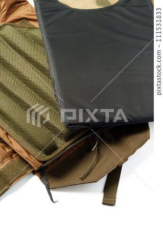 Close up of tactical bulletproof vest on white background Close up of tactical bulletproof vest on white background 111531833