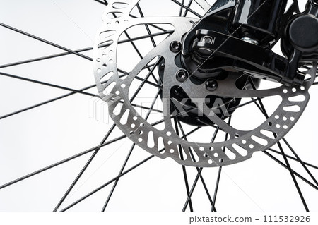 Bicycle wheel isolated over white background close up Bicycle wheel isolated over white background close up 111532926