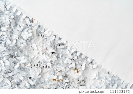 Shredded paper on white background close up Shredded paper on white background close up 111533175