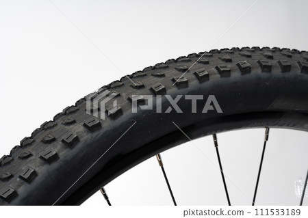 Bicycle wheel isolated over white background close up 111533189