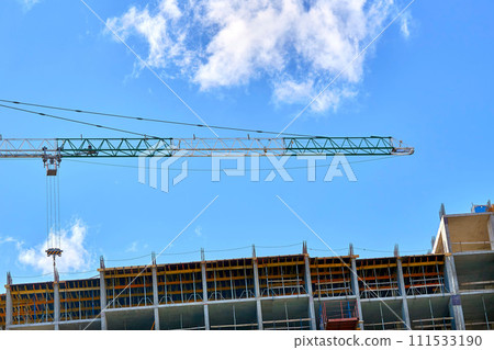 Construction high crane,building and blue cloud sky Construction high crane,building and blue cloud sky 111533190