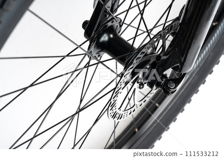 Bicycle wheel isolated over white background close up 111533212