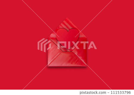 Love letter. red envelope with red valentine heart on red background, top view Love letter. red envelope with red valentine heart on red background, top view 111533796