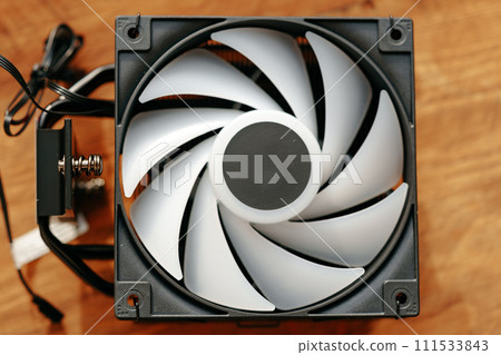 Close up of a cooler computer fan Close up of a cooler computer fan 111533843