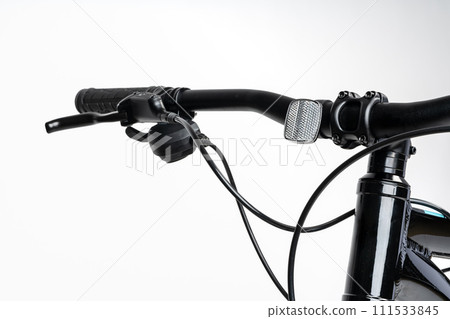 Black bicycle handlebar isolated on white background Black bicycle handlebar isolated on white background 111533845