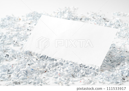 Shredded paper on white background close up Shredded paper on white background close up 111533917