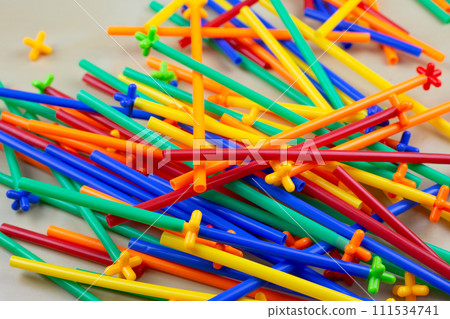 Close up photo of mess with construction set parts 111534741