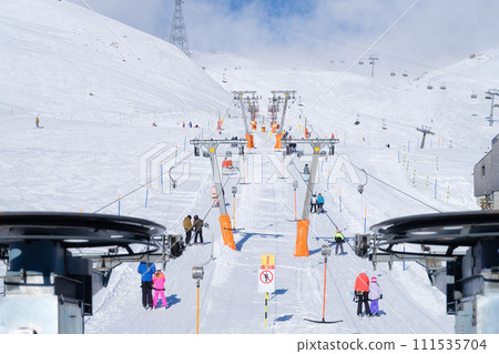 Ski resort. Elevator to the mountain slope. Winter mountain landscape. Ski resort. Elevator to the mountain slope. Winter mountain landscape. 111535704