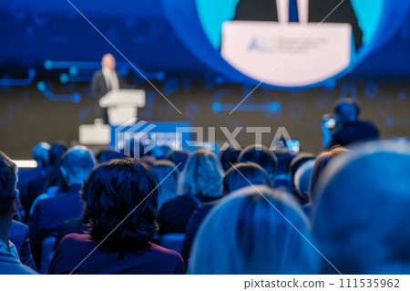 Speaker at business conference giving presentation to audience Speaker at business conference giving presentation to audience 111535962