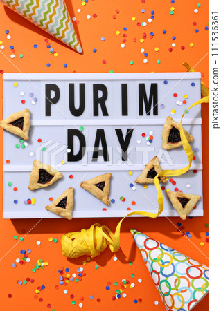 The concept of the holiday Purim, with traditional symbols. 111536361