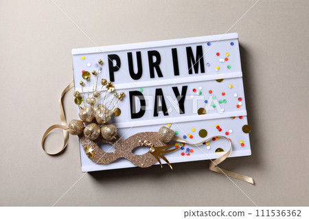 The concept of the holiday Purim, with traditional symbols. 111536362