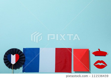 Flag of France and other symbols on a blue background. 111536439