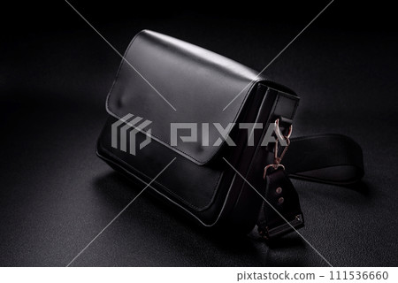 Beautiful black women's leather bag with magnetic clasps and adjustable strap Beautiful black women's leather bag with magnetic clasps and adjustable strap 111536660