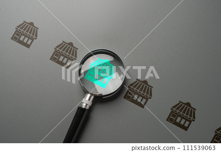 Magnifying glass and store. Shops and commercial real estate. Open a business in a high foot traffic areas, accessibility. An investment opportunity. Choose a business franchise for investment. Magnifying glass and store. Shops and commercial real estate. Open a business in a high foot traffic areas, accessibility. An investment opportunity. Choose a business franchise for investment. 111539063