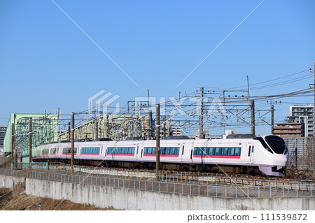 Joban Line E657 series limited express train crossing the Edogawa Bridge 111539872