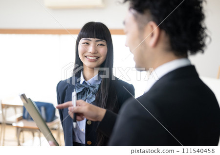 Image of students asking questions about their teacher, career guidance, consultation, etc. Backlit close-up 111540458