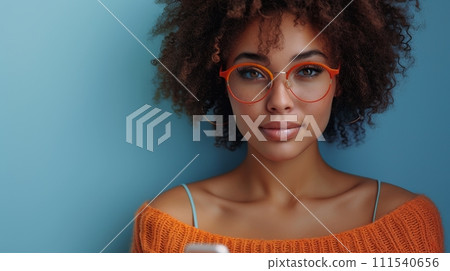 AI-generated content. On a blue backdrop, an attractive young latin woman holding her cellphone is smiling happily, doing online shopping, using apps on her smartphone, looking aside at copy space. 111540656