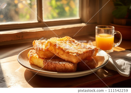 AI-generated content. Traditional Spanish dessert Torrijas. Heap of a deep fried sweet bread on a plate in the sunlight 111542259