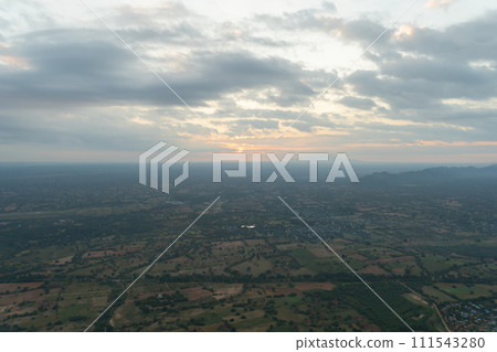 Aerial top view of burmese temples of Bagan City from a balloon, unesco world heritage with forest trees, Myanmar or Burma. Tourist destination. Aerial top view of burmese temples of Bagan City from a balloon, unesco world heritage with forest trees, Myanmar or Burma. Tourist destination. 111543280